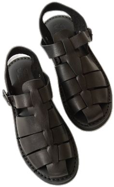 Black Leather Sandals With Stitched Sole, Classic Black Sandals With Buckle Closure, Classic Black Round Toe Sandals, Classic Closed Toe Sandals With Textured Sole, Black Sandals With Textured Sole And Single Toe Strap, Classic Black Sandals With Textured Sole, Black Leather Sandals With Rubber Sole, Black Leather Sandals With Leather Sole, Classic Black Sandals With Rubber Sole