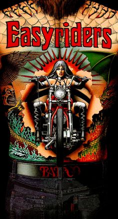 the back of a man's shirt with tattoos on his body and an image of a woman riding a motorcycle