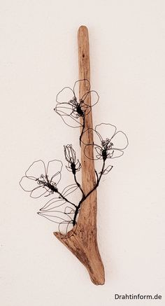 a piece of driftwood with branches attached to it