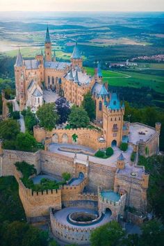 an aerial view of a castle in the countryside