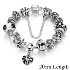 Plated with 925 Silver Charms and Murano Glass Beads Pandora Style Bracelet. Specification: Model Number: PA1823, PA1865, PA 1867Gender: WomenStyle: Classic Charm BraceletItem Type: BraceletBracelet Type: Charm BraceletMetal Type: Silver Plated Zinc AlloyMaterial: GlassChain Type: Snake ChainLength: 18CM, 20CMColor: Pink, Black, BlueOccasion: Anniversary, Engagement, Gift, Party, Wedding Black Gold Ring, Queen Jewelry, Sterling Silver Charm Bracelet, Classic Bracelets, Queen Crown, Silver Bead Bracelet, Charms Bracelet, Bangle Bracelets With Charms, Silver Charm Bracelet