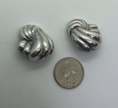 "10% OFF SALE when you spend $49.99 Fully Guaranteed & Free Shipping in the United States This is a beautiful vintage pair of sterling silver abstract earrings are in good condition. Clip On Earrings Sterling Silver Abstract Earrings 1 1/4\" L X 1\" W Marked 925 10g Pictured next to a US quarter to show relative size. Please see photos for detail. Fully guaranteed. To view more of our Screwbacks & Clip Ons click here: https://www.etsy.com/shop/DPSDeadPeoplesStuff?ref=seller-platform-mcna Silver Earrings Aesthetic Vintage, Silver Earrings Aesthetic, Vintage Silver Earrings, Earrings Aesthetic, Costume Jewelry Rings, Abstract Earrings, Evil Eye Ring, Chunky Jewelry, Ear Jewelry