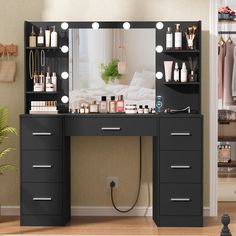 a vanity with lights and drawers in a room