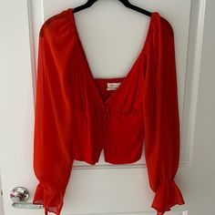 Silky Red Uo Crop Top With Buttons And Bow In The Front Never Worn Red V-neck Top From Urban Outfitters, Urban Outfitters V-neck Blouse For Fall, Urban Outfitters Red Long Sleeve Top, Red Long Sleeve Top From Urban Outfitters, Red Long Sleeve Crop Top, Crop Top With Buttons, Shirt Patterns For Women, Peplum Crop Top, Floral Babydoll Top