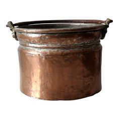 an old metal pot with two handles