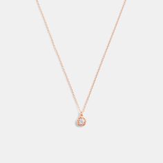 A sophisticated pick for day or night this delicate chain necklace features a polished Tea Rose bezel with a sparkling crystal center. It’s finished with an adjustable clasp closure to wear long or short. | Coach Halo Tea Rose Pendant Necklace - Women's - Rose Gold Rose Gold Diamond Necklace With Delicate Chain, Rose Gold Diamond Necklace With Delicate Round Pendant, Elegant Rose Gold Charm Necklaces For Formal Occasions, Feminine Rose Gold Necklace With Adjustable Chain, Rose Gold Solitaire Necklace With Delicate Chain, Delicate Rose Gold Solitaire Necklace, Coach Rose Gold Jewelry For Gifts, Everyday Rose Gold Teardrop Pendant Necklace, Everyday Rose Gold Solitaire Necklace With Delicate Chain