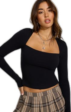 Ribbed High Stretch Top For Night Out, Fitted Black Long Sleeve Ribbed Top, Fitted Black Ribbed Long Sleeve Top, Fitted Black Long Sleeve Top With Ribbed Detail, Trendy Fitted Long Sleeve Top, Fitted Black Long Sleeve Top In Elastane, Trendy Stretch Long Sleeve Top In Elastane, Trendy Stretch Long Sleeve Top, Trendy Stretch Elastane Long Sleeve Top