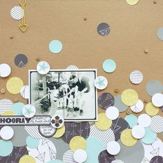 a scrapbook page with confetti and paper circles on the cover, including a photo