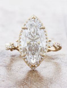 Whimsical Engagement Ring, Marquise Engagement Ring Halo, Simple Wedding Bands, Future Engagement Rings, Engagement Rings Marquise, Yellow Gold Setting, Eternity Wedding Band, Three Stone Engagement Rings, Marquise Diamond