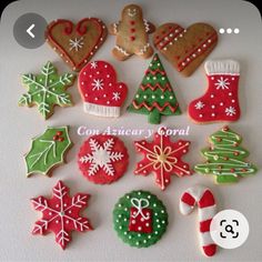 decorated christmas cookies arranged in different shapes and sizes