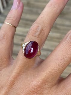 Genuine Pink Tourmaline measures 14mm x 10mm. The head of the ring measures 14mm at its widest point. The ring weighs 5.5g. The band tapers to 2.25mm at the back of the shank.  It is stamped 14k yellow gold. This ring is a size 5.25 and sizable. We are happy to provide sizing for an additional charge.  Let me know if you need a quote. Ruby Ring Cabochon, Pear Cabochon Ring, Yellow Gold Tourmaline Cabochon Ring, Luxury 14k Gold Ruby Cabochon Ring, Formal Ruby Oval Cabochon Ring, Oval Cabochon Ruby Gemstones, 14k Gold Oval Cabochon Gemstone Dome Ring, 14k Gold Dome Ring With Oval Cabochon, 14k Gold Dome Ring With Oval Cabochon Gemstone