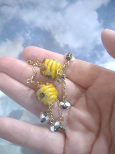 Did you hear about the buzz.... 🐝🍯                                   ❤️❤️❤️ I take the time to ensure that all my jewelry is well handcrafted, light weight and cute. The only I can is that sense these are handmade the earrings that you may receive may differ slightly from photo. *Handmade using the strongest polymer clay *I used three coats of satin glaze by Sculpey for shine and protection against ware. *Hypoallergenic, nickel free earring hooks. *Eye pins are inserted with permanent super glue. Handle with care,  polymer clay (which is what I use to make my jewelry pieces) is a strong material, but not unbreakable. So please store away in a safe place when not in use. Keep away from any kind of moisture and remove before bathing or swimming. Honey Bee Earrings, Honey Bee Hives, Nickel Free Earrings, Bee Earrings, Eye Pins, Earrings Elegant, Fun Earrings, Bee Hive, Honey Bee