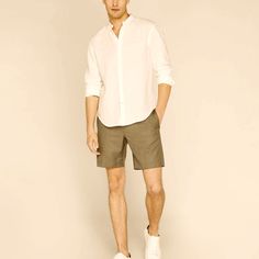 The Look Of A Polished Trouser, The Comfort Of An Easy Short. Featuring An Extended-Tab Waistband And Four-Pocket Silhouette, This Smooth, Plain-Weave Pair Is Designed With All Your Summer Events In Mind. Model Is 6'2" Wearing A Size 32 Designed For A Tailored Fit That Hits Just Above The Knee 84% Polyester; 16% Viscose Slim Fit With An 9" Inseam, 21.25” Inseam; Based On A Size 32 Zip Fly With Hook-And-Bar And Button Closure Flat Front; Extended-Tab Waistband; Belt Loops; Two Side Pockets; Two B Refined Fashion, Mens Club, Summer Events, Club Monaco, Above The Knee, Mens Shorts, Trousers, Slim Fit, Man Shop