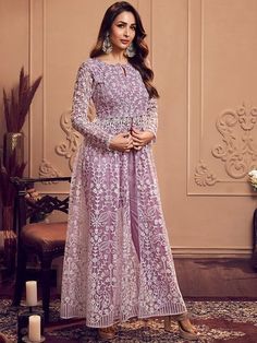 * Floral Embroidered Keyhole Neck Long Sleeve High Slit Thread Work Kurta Set Indian Wedding Wear Salwar Kameez / Silk Party Wear Kurta Set / Indian Ethnic Dress / Cotton Kurta Set / Plus Size Silk Kurta Dress / Traditional Indian Wear / Salwar Kameez Dupatta / Kurti Palazzo Set * Lavender embroidered Kurta with Trousers * Kurta design:- * Floral embroidered * A-line shape * Keyhole neck * long regular sleeves * High slit style * Thread work detail * Floor length with flared hem * Trousers design:- * Solid Trousers * Partially elasticated waistband * Slip-on closure *Fabric Top: Net Top Inner: Shantun Bottom: Cotton Blend *Wash Care:- Dry Clean *Wash Care:- Machine wash AVAILABLE IN 7 SIZES THEY ARE IN FOLLOWING MEASUREMENTS IN INCHES:- XXS:- Bust-32/Shoulder-13/Top Length-55/Bottom Waist- Long Kurti Designs Party Wear, Trendy Outfit Inspo, Kurti Palazzo, Malaika Arora, Long Kurti Designs, Fancy Kurti, Kurta Dress, Silk Bottoms, Indian Wedding Wear