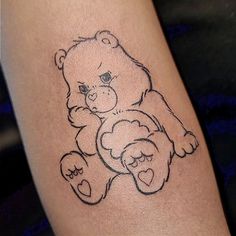 a drawing of a teddy bear on the leg