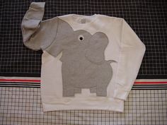 "UPcycled from NEW sweatshirts, crew neck sweatshirt in a 80% cotton 20% polyester blend with elephant applique and trunk sleeve. All my appliques are designed by me, hand cut, and sewn by me, NOT just stuck on, so there will be no fear that your ear may fall off later.  These are adult unisex sizes, please choose your size a purchase.  Small 40\" chest Medium 44\" chest Large 48\" chest X-large 52\" chest" Elephant Sweater, Elephant Sweatshirt, 5 Little Monkeys, Elephant Applique, Dress Up Ideas, Elephant Trunk, Kids Jumpers, Diy Projects For Kids, Diy Costume