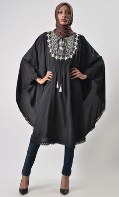 A perfect wardrobe piece for everyday Round-neck with embroidery Loose kaftan style Lace detail Full sleeves FABRIC: Creepe CARE: Machine wash cold Black Embroidered Kaftan For Vacation, Bohemian Long Sleeve Kurta With Embroidered Hem, Black Bohemian Kaftan With Floral Embroidery, Black Poncho For Vacation, Black Bohemian Top With Embroidered Neckline, Black Embroidered Kaftan For Spring, Embroidered Black Kaftan For Spring, Open Abaya, Kaftan Style