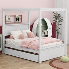 a bedroom with pink walls and white furniture in the corner, including a bed frame