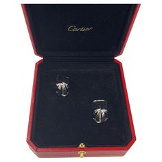 Elevate your formal attire with these luxurious men's cufflinks from Cartier, 24518A featuring a sophisticated Penelope logo in 18ct white gold. Crafted with meticulous attention to detail, these cufflinks embody the perfect fusion of classic elegance and modern sophistication. Total Weight: 13.27g Dimensions: 15.93mm x 12.48mm SMS9379 Luxury White Gold Cufflinks For Men, Elegant White Gold Cufflinks, Cartier Cufflinks, Luxury White Gold Cufflinks, Designer White Gold Polished Cufflinks, Vintage Cartier Watch, Sapphire Dress, Tank Watch, Cartier Watch