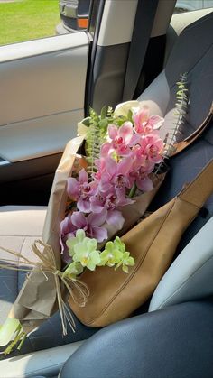 flowers in the back seat of a car