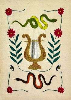 an embroidered design with two snakes and flowers