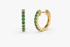 "Natural Emerald Earrings / Huggie Earrings / 14k Gold Emerald Huggie Hoop Earrings / Small Hoop Emerald Earrings / Jewelry Gift Ferko's Fine Jewelry Item Details ✔Made to Order ✔Gold Kt: 14K (also available in 18K) ✔Available Gold Color: Rose Gold, Yellow Gold, White Gold ✔The Inner diameter of Earrings: 10MM ✔The Outer diameter of Earrings: 12MM ✔Round Emerald: 14 pcs 1.5 MM ✔Number of Stones: 14 ✔Total CTW: 0.25 Ctw (Total Carat Weight for the Pair) ✔Ready to Ship in 7-10 Business Days ★ ★ ★ Green 14k Gold Hoop Earrings, Green Small Hoop Earrings Fine Jewelry, Elegant Green 14k Gold Huggie Earrings, Green Huggie Earrings With Prong Setting, Green Small Hoop Huggie Earrings Fine Jewelry, Green 14k Gold Huggie Earrings Gift, Green Small Hoop Huggie Earrings, Green Huggie Fine Jewelry Earrings, Green Huggie Earrings Fine Jewelry