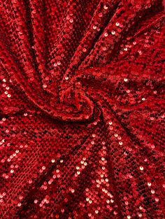 "Luxury red sequins embroidered on great quality of stretch velvet 4-way stretch 58/60\" Sold by the YD. Ships Worldwide from Los Angeles california USA. Content: 90% Polyester; 10% Spandex" Red Embroidered Sequin Fabric For Party, Red Sequin Fabric With Contrast For Party, Red Sequin Fabric With Contrast Detail For Party, Red Sequin Fabric For Holiday Parties, Red Embellished Sequin Fabric For Festive Occasions, Festive Red Embellished Sequin Fabric, Red Fitted Sequin Fabric For Festive Occasions, Fitted Red Sequin Fabric For Festive Occasions, Festive Red Sequin Fabric