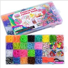 a plastic box filled with lots of different colored bracelets and beads on top of each other