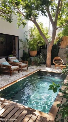 a small pool in the middle of a backyard