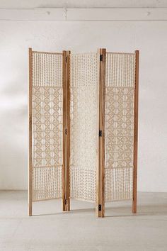 the room divider is made out of wood