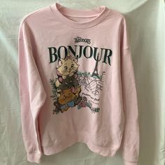 Disney The Aristocats Bonjour Paris Fleece Lined Sweater *New Without Tags, Purchased Last One At Store *Size Large (Oversized Look) *Powder Pink Pullover Sweater *Disney's The Aristocats, Bonjour Paris Screen Printed Graphic Details On Front And Back *Fleece Lined Interior *Materials: Polyester Disney Letter Print Sweatshirt For Winter, Aristocats Outfit, Pink Long Sleeve Disney Top, Disney Sweaters Vintage, Marie Aristocats Pillow, Aristocats Everybody Wants To Be A Cat, Marie Aristocats Merch, Paris Clothing, Interior Materials