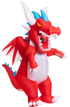 an inflatable red and white dragon is standing upright with its mouth wide open