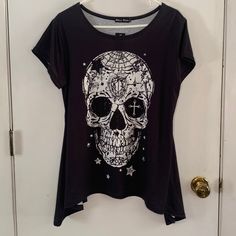 Nwt Black T-Shirt Style Knit Top With Shark Bite Hem White Skull Embellished With Black And Clear Bling Measurements Are Not Guaranteed. Length Is Measured From Center Of Back Neck Chest 20 1/2" Length 24" Keyword: Moto, Motorcycle, Harley Davidson, Goth, Gothic, Dark, Steampunk, Sturgis, Halloween Edgy Skull Print Crew Neck Top, Emo Skull Print Short Sleeve Tops, Emo Short Sleeve Top With Skull Print, Black Emo Top With Skull Print, Emo Skull Print Top For Fall, Black Stretch Tops With Skull Print, Emo Skull Print Tops For Fall, Fall Emo Skull Print Top, Black Stretch Top With Skull Print