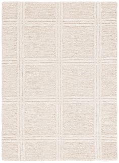 a white rug with squares on it