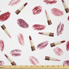 red lipsticks on a white background