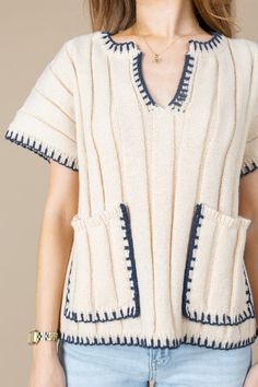 Details Wide rib knit sweater Contrasting stitch details Short sleeves V neckline Front pockets Materials and Care Self:100%polyester Hand wash cold Line dry Rib Knit Sweater, Ribbed Knit Sweater, Model Fits, V Neckline, Knit Sweater, Rib Knit, Sweaters & Cardigans, Knitted Sweaters, Denim Jeans