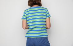 Women's striped shirt Size Medium listed Across chest - 18.5 inches Length - 22 inches Good condition! z33 Colorful Grunge, Striped Shirt Women, Toned Women, Striped T Shirt, Warm Sweaters, Blue Shorts, Short Sleeve Top, V Neck Tops, Striped Shirt