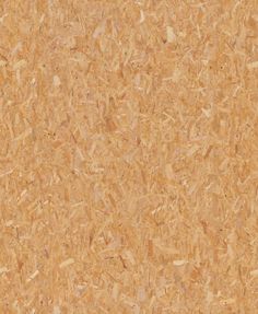 a close up view of the surface of a cork board