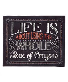 a sign that says life is about using the whole box of crayons on it