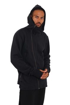 Get streetwear vibes with loungewear feels in the Hilo Mens High Neck Hoodie. Made with super thick organic cotton, this oversized hoodie layers well and is perfect all year round. Style it with your favorite harem pants and it will easily transition from loungewear to streetwear. FEATURES: Hooded High collar zipped up Extra large side zip pockets Asymmetrical zipper Thumbhole cuffs that act like fingerless gloves Oversized relaxed fit Preshrunk Machine washable Crafted from heavyweight 100% org High Neck Hoodie, Streetwear Shop, Neck Hoodie, Oversized Hoodie, Cotton Hoodie, Oversize Hoodie, High Collar, Fingerless Gloves, Side Zip