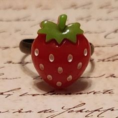 "Hypo-allergenic adjustable rings made with resin strawberry flatbacks! Ring base options are: copper or silver-tone. Strawberry measures approx. 1/2\"	in stock	4.00 USD	"	5.00 USD	Jewelry > Rings > Statement Rings
"	sellers_with_a_sale	false	https://www.etsy.com/listing/1328716180/wooden-meeple-adjustable-ring	adult	etsy://listing/1328716180?ref=applinks_android	KelsMercantile	Pink	new	en-US	"	false	unisex	0.58	Apparel & Accessories > Jewelry > Rings	https://i.etsystatic.com/5964846/r/il/accc70 Strawberry Accessories, Ceramic Witch, Strawberry Things, Strawberry Ring, Food Rings, Gift Basket, Adjustable Ring, Dream Room, Accessories Jewelry