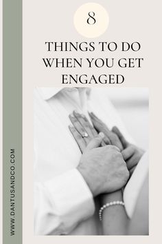 two hands holding each other with the words 8 things to do when you get engaged