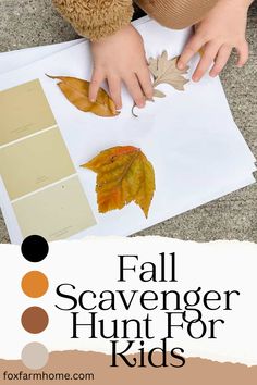 a young child is playing with leaves on paper and glue to make a fall scavenger hunt for kids