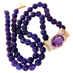 Amethyst Diamond beaded necklace. 6 mm natural amethyst. Vivid purple, clean clarity. 5 carat natural oval amethyst. Full cut brilliant clean clarity and transparent. Measures 12 x 9 mm .36 carat natural diamonds round brilliant full cut H color vs2 clarity 14 karat yellow gold, and clasp. Total weight of necklace 20grams 3 Sisters, Bead Necklace, Round Brilliant, Cartier, Natural Diamonds, Violet, Amethyst, Beaded Necklace, Jewelry Necklaces