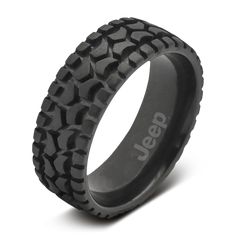 an image of a black ring with tire treads on the outside and inside it