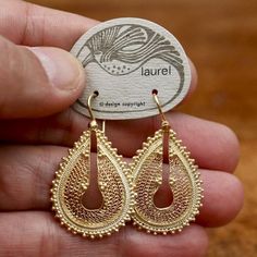 Indian inspired dangles featuring filigree and granule work in a teardrop shape. Hoop back. 24k gold over brass base. About 2 inches tall.The revival earrings here are vintage from the 1970's - they were designed by Shashi Singapuri for the Laurel Inc line and crafted by hand. Aluminum Earrings, Replica Jewelry, Indian Inspired, Laurel Burch, Pattern Tattoo, Garnet Earrings, Earring Sale, Large Earrings, Brass Jewelry