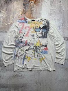 Richmond 90's T-shirt With Long Sleeves and Multiple Prints in Art Style Size: XXL Chest: 23.23in/59cm Length: 27.56in/70cm Shoulders: 19.29in/49cm Sleeve Length: 26.38in/67cm Condition: 7/10; Used, has signs of wear. Please check all photos. Delivery worldwide with tracking. Dispatch within 24 hours after payment. And it usually takes 7-21 business days. 90s Style Graffiti Print Top With Relaxed Fit, 90s Style Tops With Graffiti Print And Relaxed Fit, 90s Style Relaxed Fit Tops With Graffiti Print, 90s Oversized Graphic Design Tops, Oversized 90s Graphic Design Top, Oversized Graphic 90s Style Top, Oversized 90s Graphic Top, Vintage Long Sleeve Graphic Tops, Vintage Long Sleeve Tops With Graphic Design