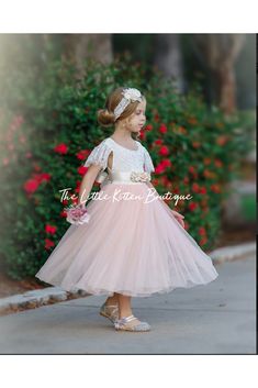 Our enchanting butterfly cap sleeve, full length flower girl dress, is made with a delicate white lace bodice and choice of (5) fully lined, tulle colors for the skirting. The V shaped back with unfinished lace adds the perfect amount of boho chic look to this amazing dress. The long sleeve lace sleeves are finished with the perfect amount of detail. You have the option to choose a plain, jeweled Sash or Flower Sash which is detachable and simply ties around the waist, for re-use. You select the Fitted First Communion Dress With Tulle Skirt, Princess Bridesmaid Dress With Lace Trim, Bridesmaid Princess Dress With Lace Trim, First Communion Lace Ball Gown With Tulle Skirt, First Communion Ball Gown With Lace And Tulle, Tulle Tutu Dress With Lace Bodice For First Communion, Fitted Tulle Ball Gown For First Communion, Lace Ball Gown With Tulle Skirt For First Communion, Princess Style Fitted First Communion Dress With Tulle Skirt