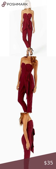 Lulus Burgundy Strapless Knot tie Jumpsuit NWT New with tag!  Very flattering strapless sweetheart neckline jumpsuit with a knotted tie sash at waist. Top has boning at sides and at bust for a flattering fit. Burgundy/Maroon color. Size small. 97% Polyester, 3% Spandex. Has good stretch to it. Mustard Seed Other Strapless Jumpsuits And Rompers For Date Night, Strapless Solid Jumpsuits And Rompers For Date Night, Elegant Strapless Jumpsuits And Rompers For Going Out, Elegant Bandeau Jumpsuits And Rompers For Party, Red Strapless Jumpsuit For Summer Party, Chic Strapless Jumpsuits And Rompers For Going Out, Bandeau Strapless Jumpsuit For Party, Chic Bandeau Jumpsuits And Rompers For Party, Red Strapless Jumpsuits And Rompers For Party