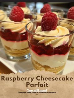 raspberry cheesecake parfait with whipped cream and fresh raspberries